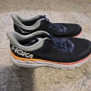 Hoka Black and White Sneakers with Orange Sole